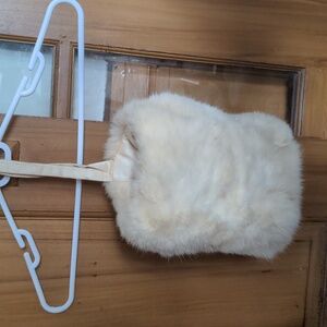 Antique adult-sized cream rabbit muff